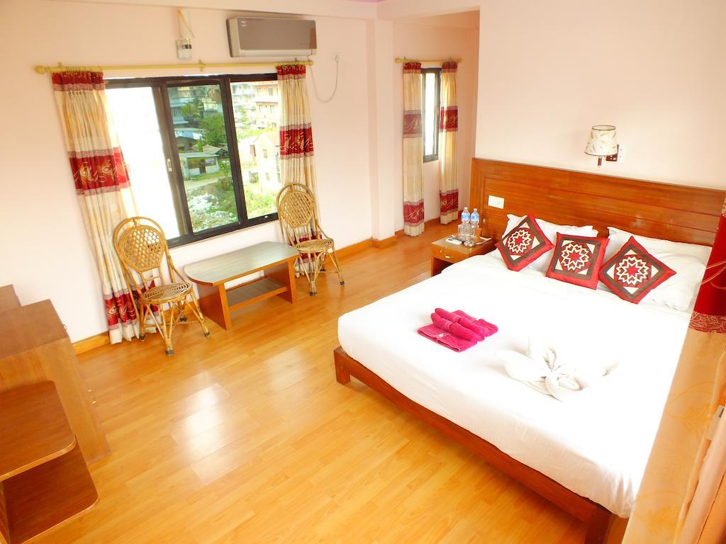 Hotel Greenland Pokhara Quarto foto