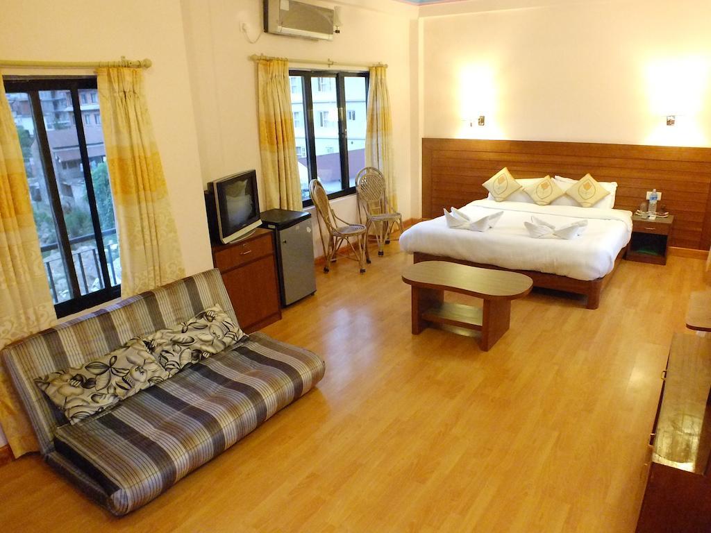 Hotel Greenland Pokhara Quarto foto