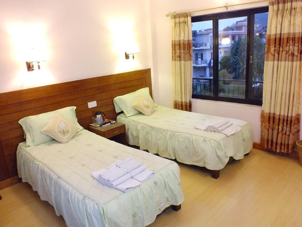Hotel Greenland Pokhara Quarto foto